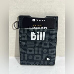 THREAD VERTICAL LEATHER WALLET Built in metal D-ring to attach lanyard, key hook